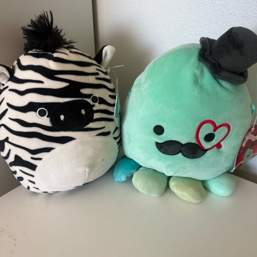 “Freddie” and “Eiko” Squishmallows